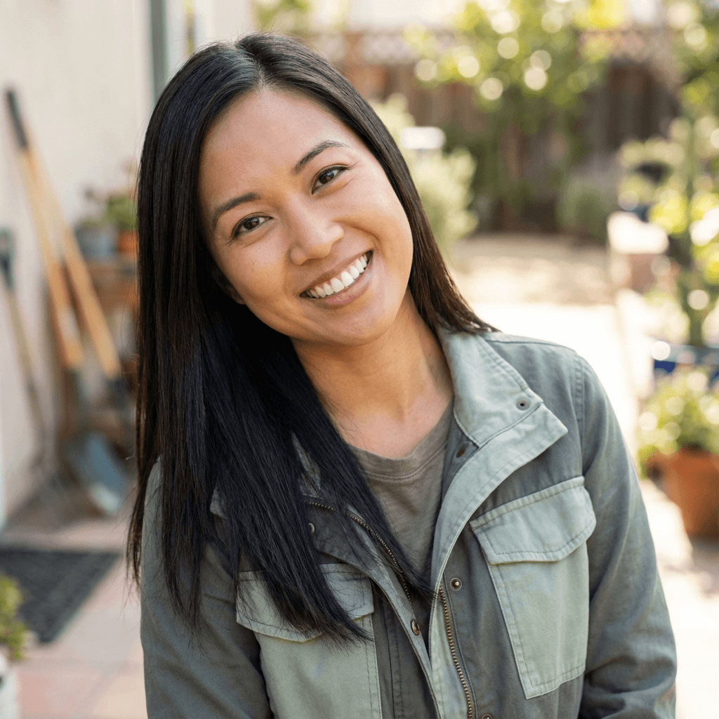 Margaret Chen smiling in her home kitchen